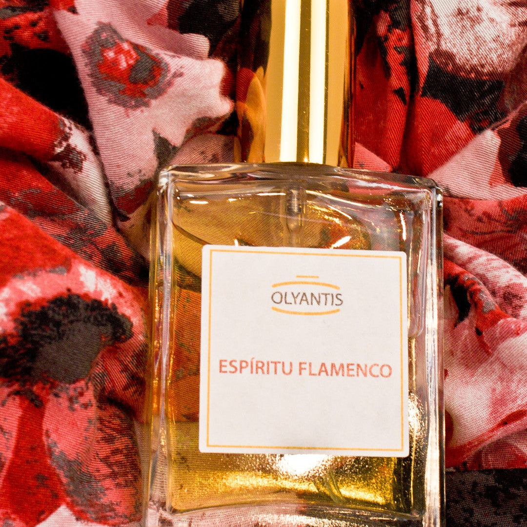 Espíritu Flamenco 60 ml Eau de Parfum flat on red, floral silk. 