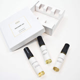 Olyantis's white box labeled Discovery Set containing three 5 ml glass bottles, arranged on a clean white background. The box is opened, showing the 3 perfume samples. 
