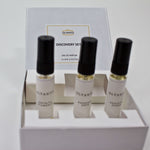 Olyantis's Discovery Set of 3x 5 ml perfume glass bottles prim-plan, inside the white box opened.