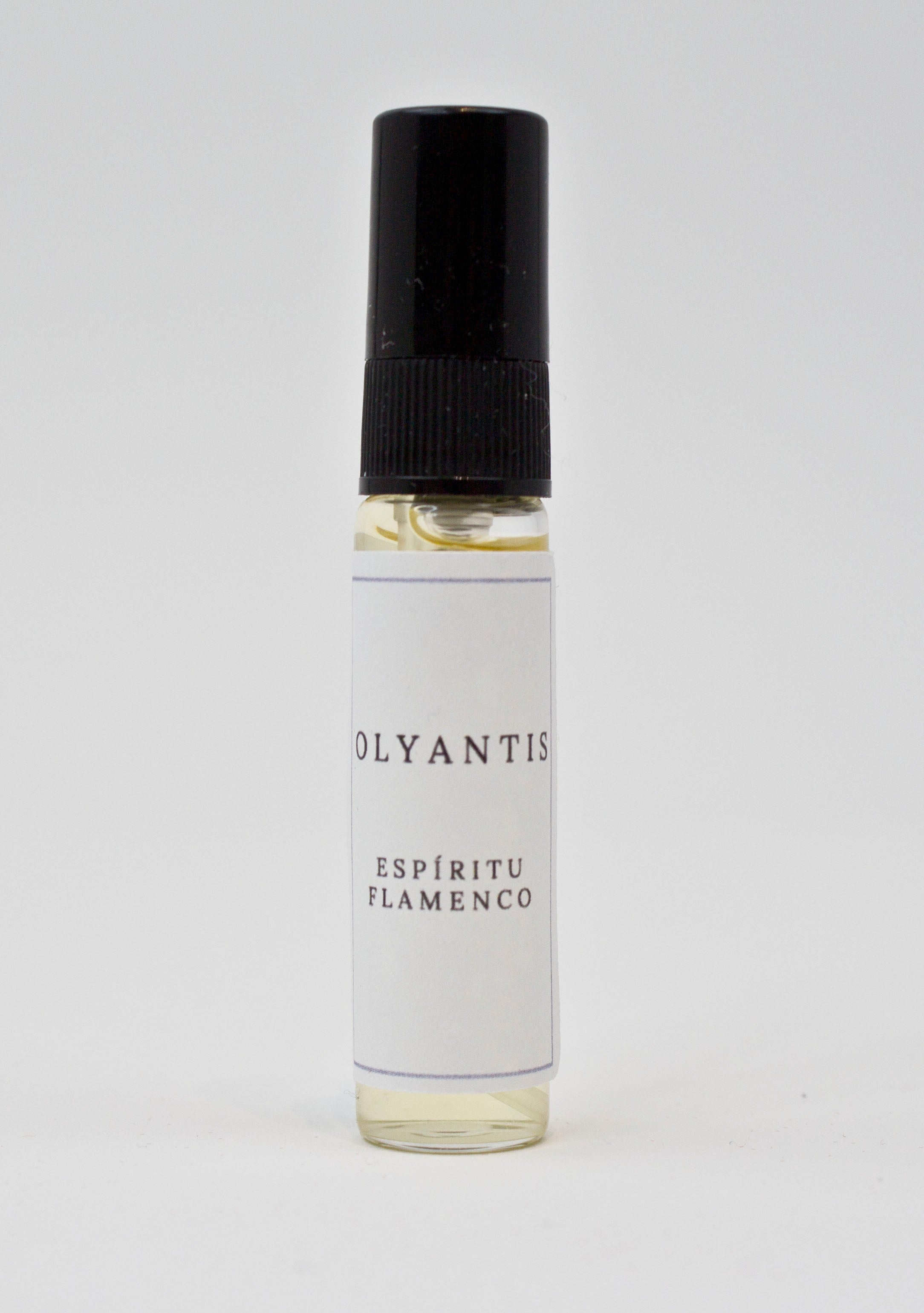 Olyantis's Espíritu Flamenco 5 ml perfume glass bottle on a white background.