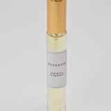 Olyantis's Espíritu Flamenco 10 ml perfume glass bottle with gold cap on a white background.