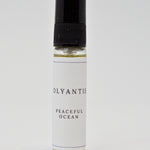Olyantis's Peaceful Ocean 5 ml perfume glass bottle on a white background.