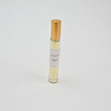 Olyantis's Peaceful Ocean 10 ml perfume glass bottle with gold cap on a white background. 