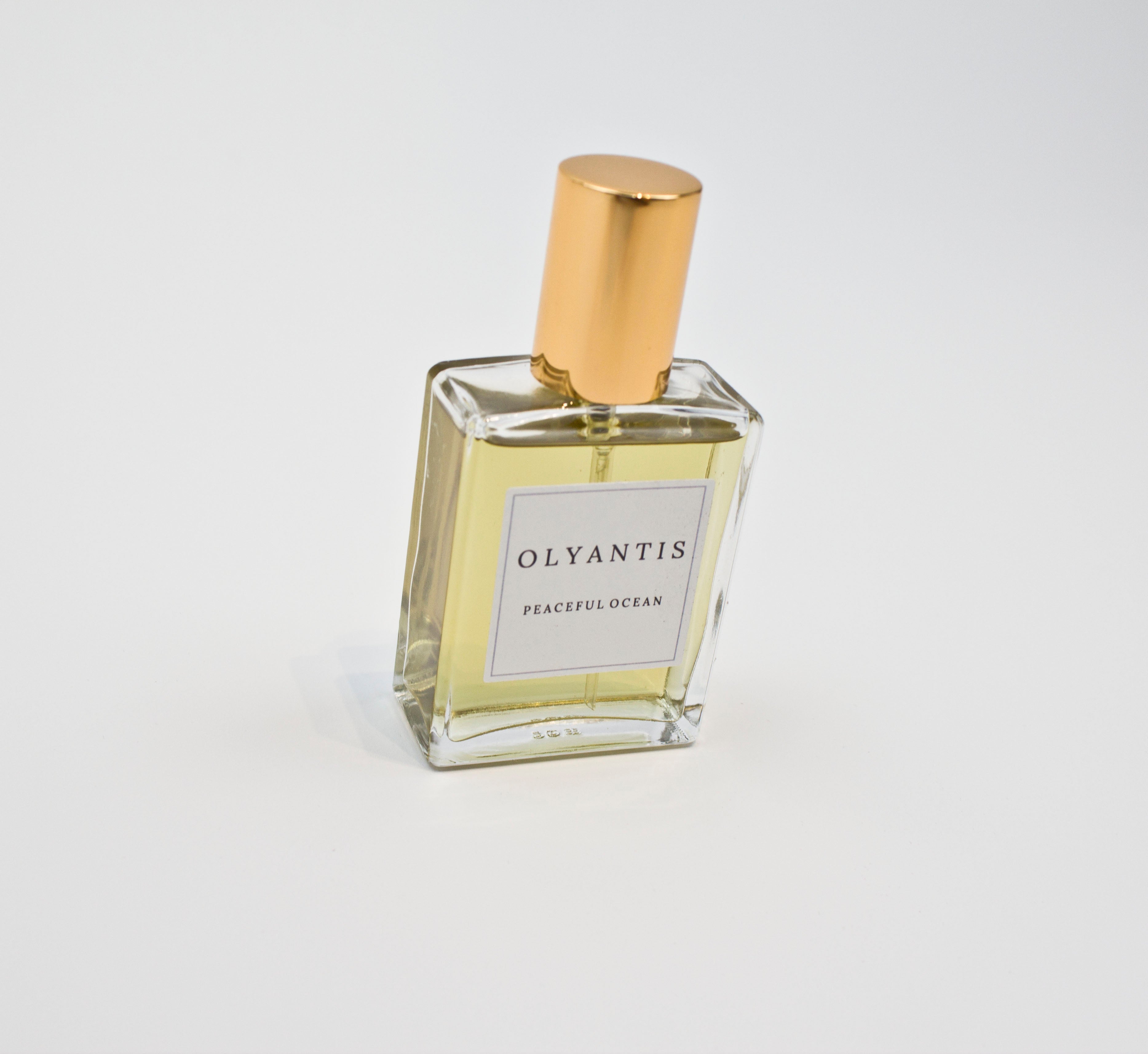 Olyantis's Peaceful Ocean 60 ml glass bottle perfume, in angle. 