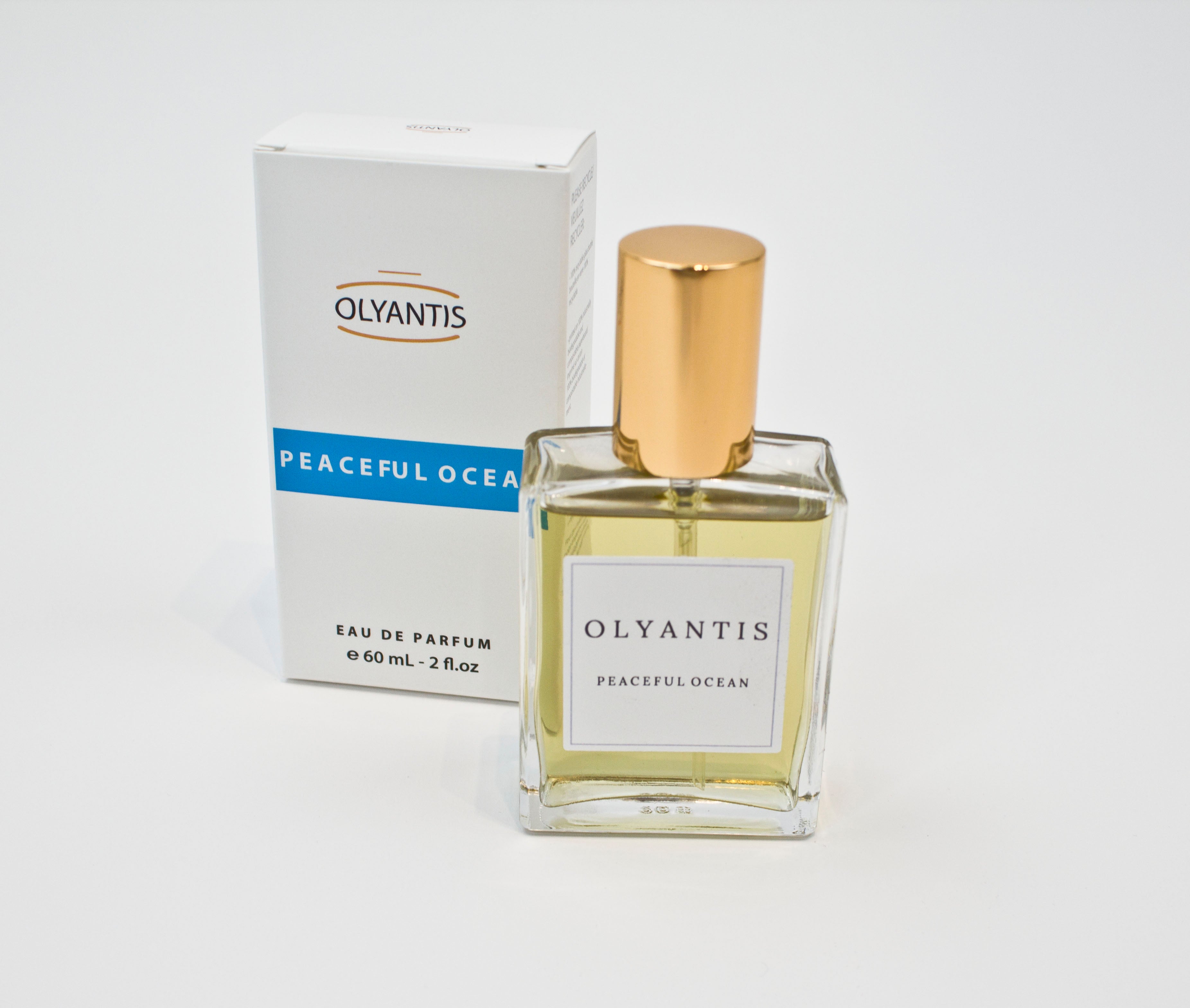 Olyantis's Peaceful Ocean 60 ml perfume beside its box. 