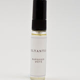 Olyantis's  Rapsodie D'Été 5 ml perfume glass bottle on a white background.