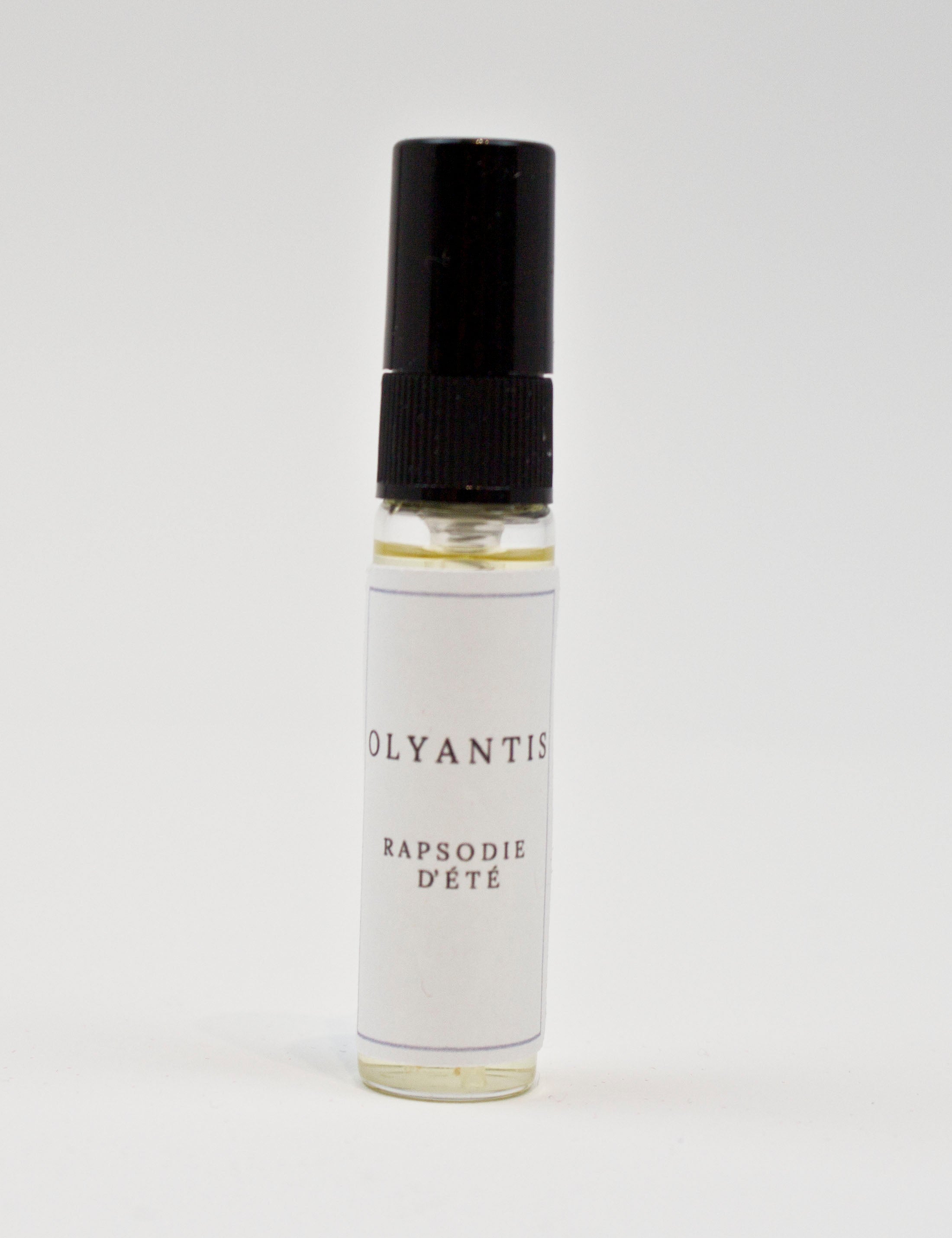 Olyantis's  Rapsodie D'Été 5 ml perfume glass bottle on a white background.
