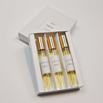 Olyantis's Travel Set of 3x 10 ml perfume glass bottles in its white box opened to display the perfume bottles. 