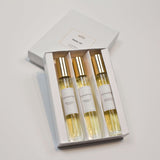 Olyantis's Travel Set of 3x 10 ml perfume glass bottles in its white box opened to display the perfume bottles. 