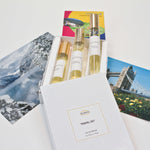 Olyantis's Travel Set of 3x 10 ml perfume glass bottles on 3 postcards from 3 different global destinations, including Lake Louise in Canada, London UK, and south of France. 
